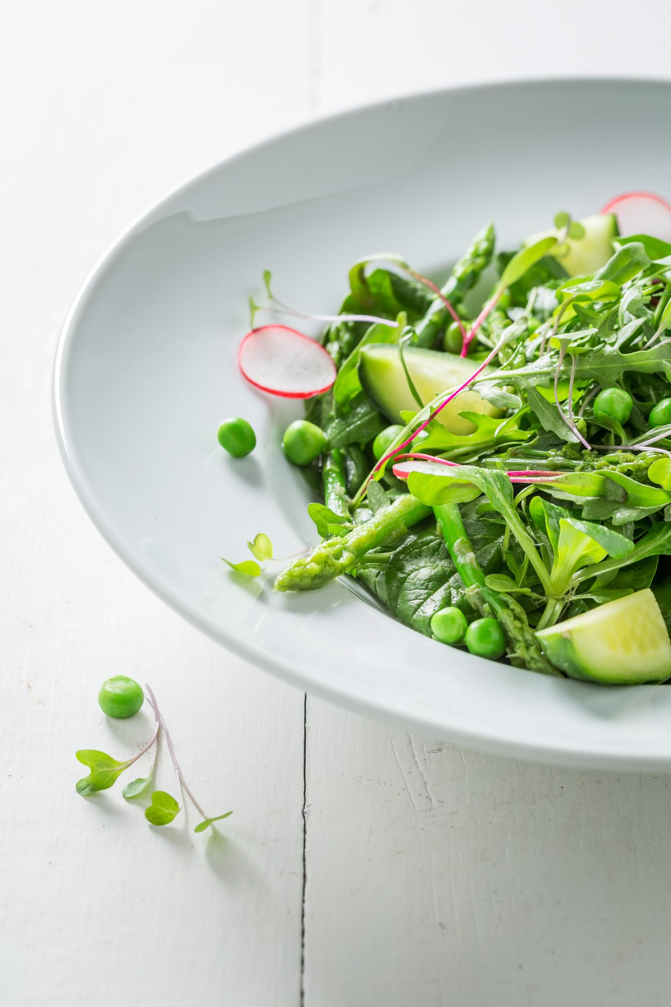 Close-up of a salad bowl with bright greens